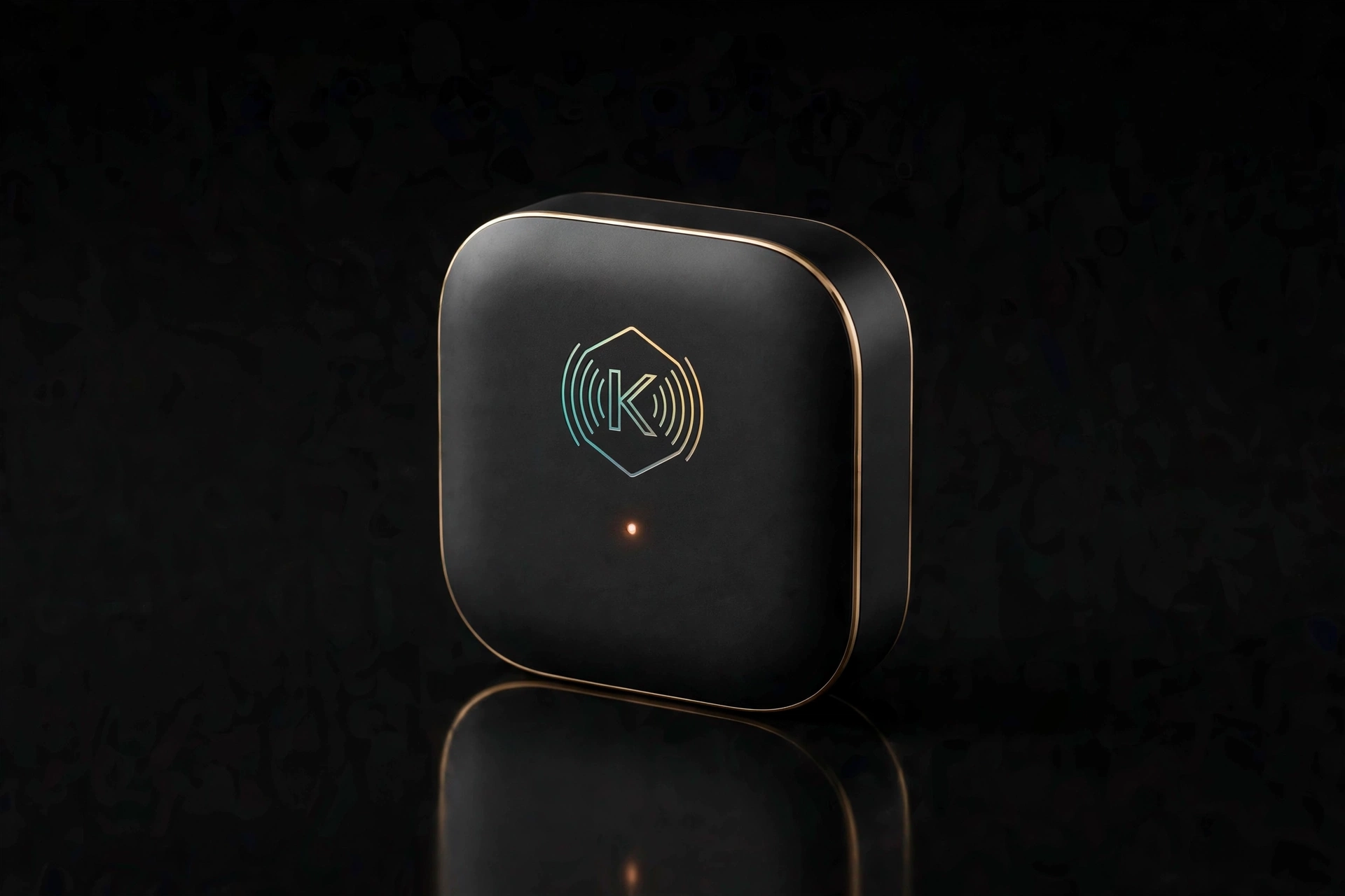 Root Mini design render: a compact rounded-square hub with iridescent K emblem